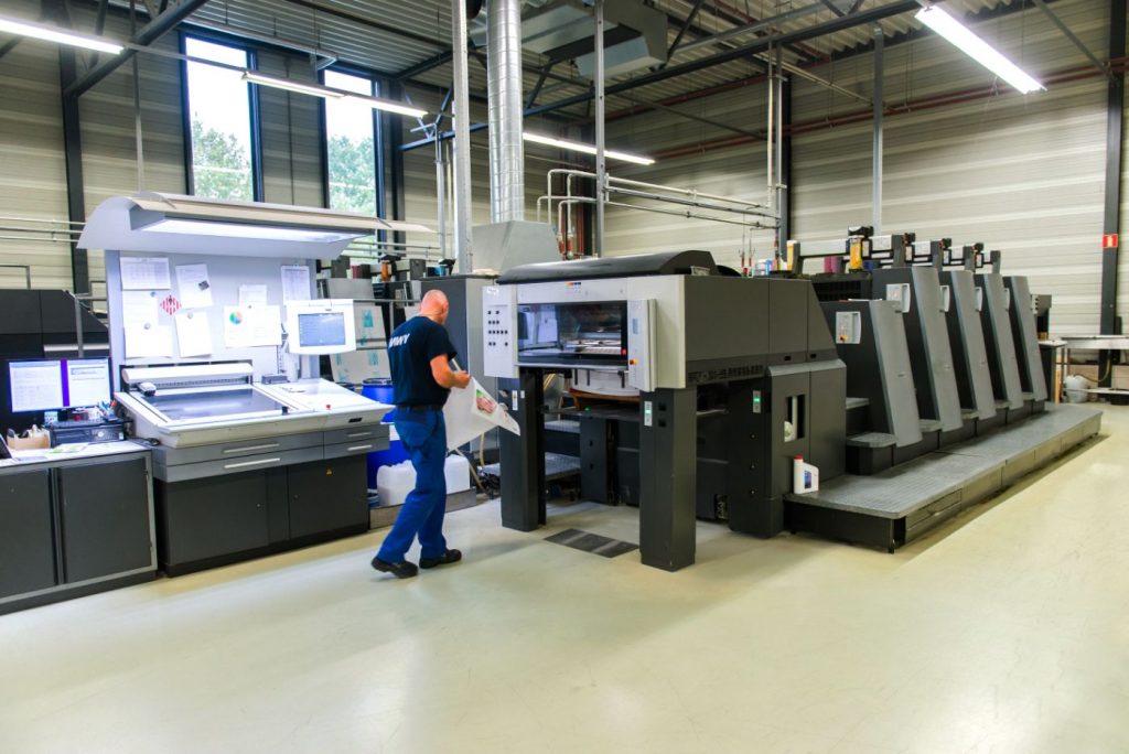 printer takes printing sheet from printing press